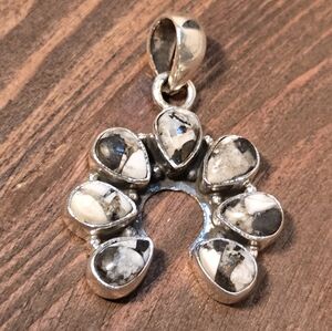 White Buffalo Naja Pendant Set In Sterling Silver